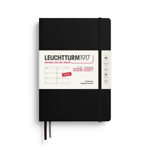 Black Leuchtturm1917 planner with white cover displaying text and design elements.