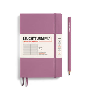 Purple notebook with a pencil on a white background, featuring Leuchtturm1917 branding.