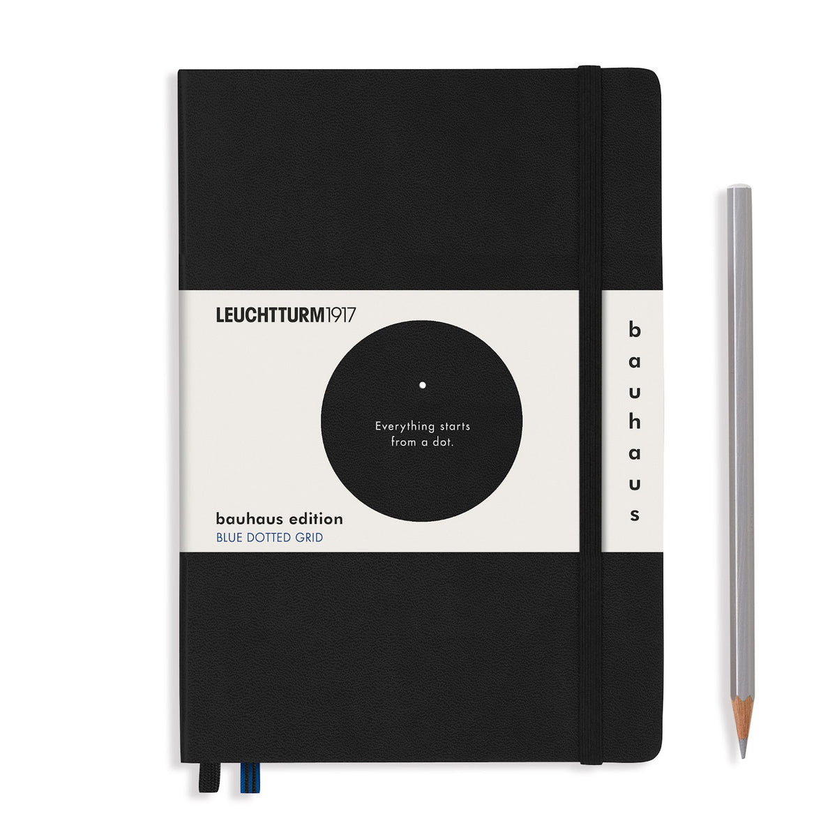Black notebook with Bauhaus edition label and a pencil on a white background