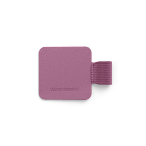 Purple pen loop on a white background