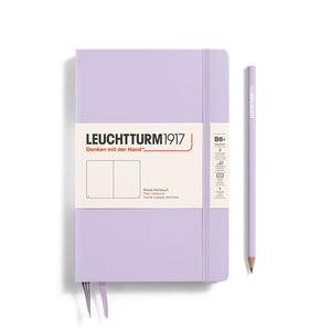 Purple notebook with a pencil on a white background, featuring Leuchtturm1917 branding.