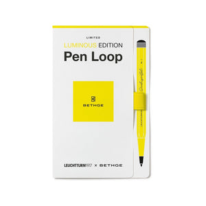 Yellow pen loop with packaging on a white background