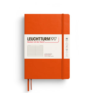 Orange notebook with white label featuring 'Leuchtturm1917' on a white background