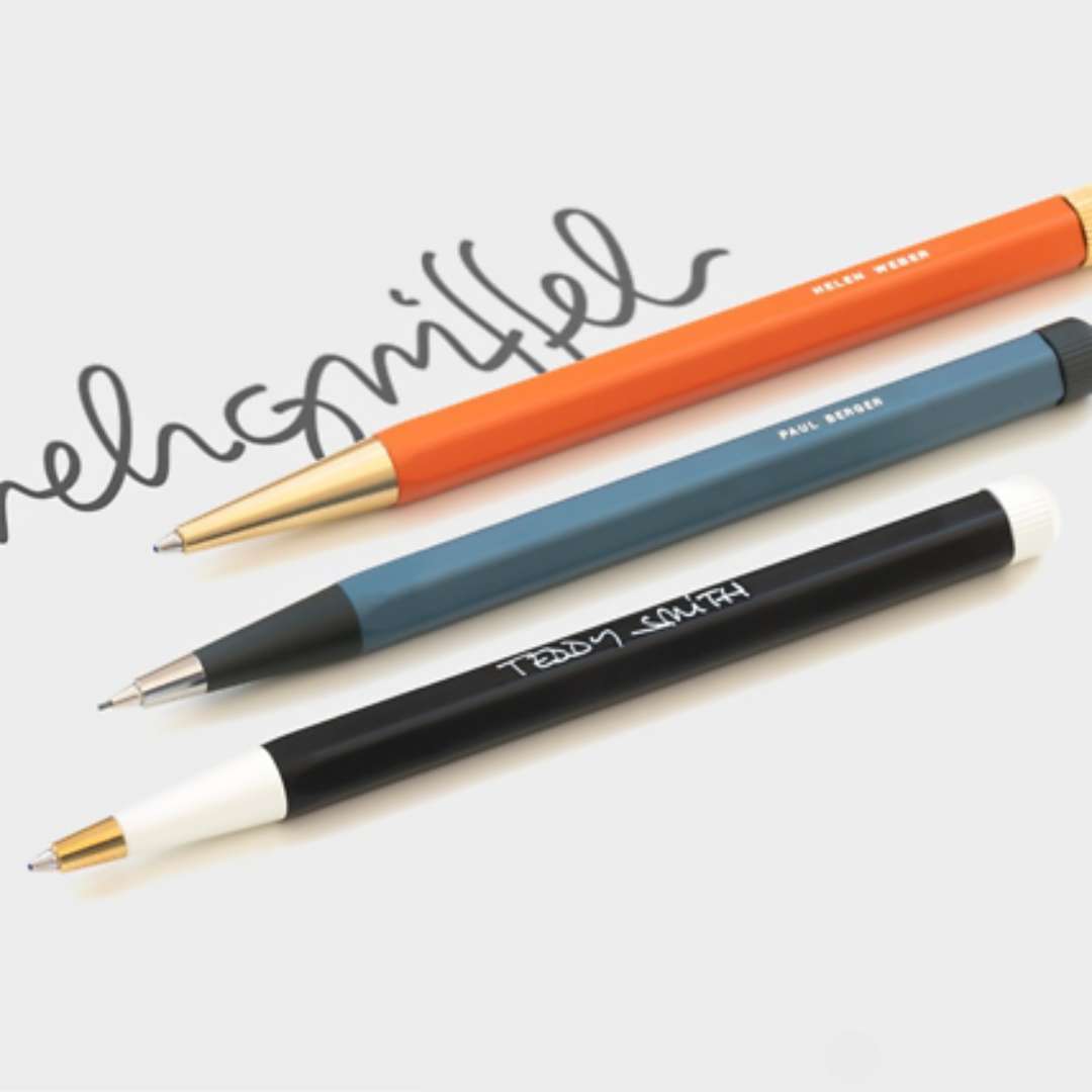 Three pens with different colored bodies on a white background