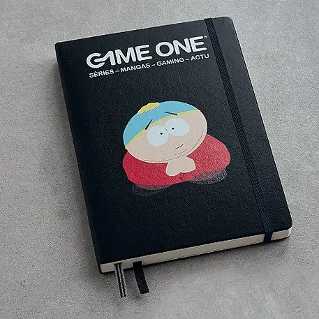 Black notebook with a cartoon character on the cover, featuring the 'Game One' branding.