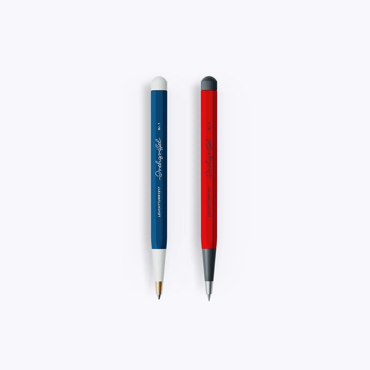 Blue and red pen and pencil on a white background