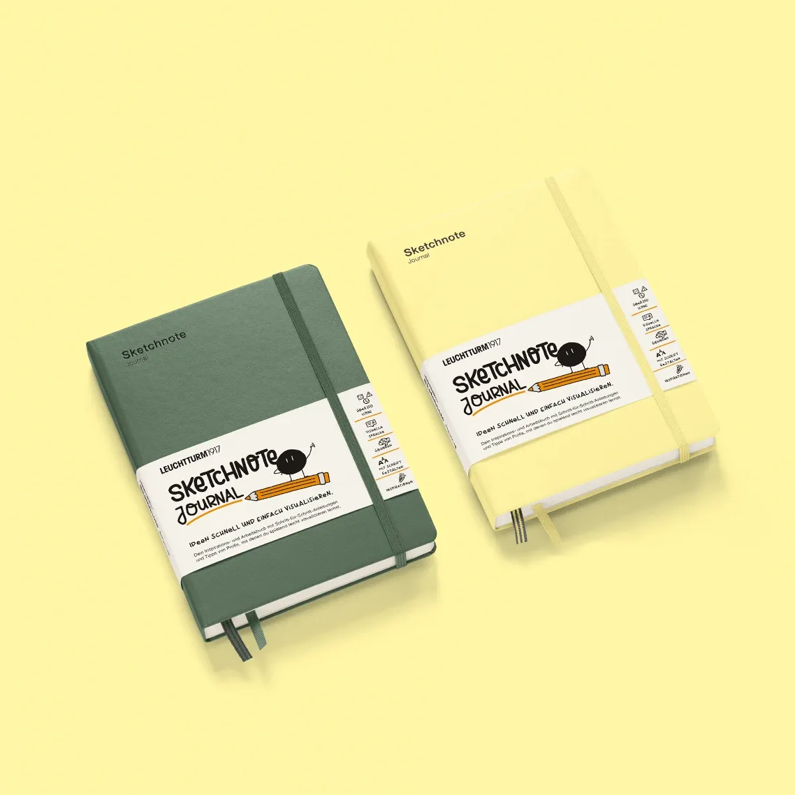 Two sketchnote journals, one green and one yellow, on a light yellow background.