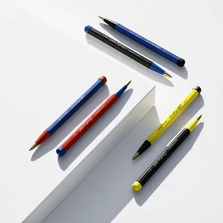 Set of colorful pens on a white background