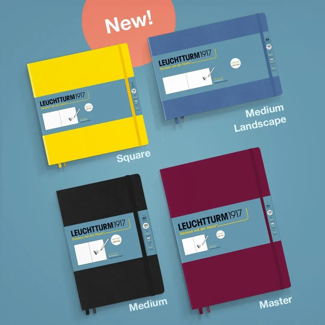 Four notebooks from Leuchtturm1917 on a blue background with color labels.