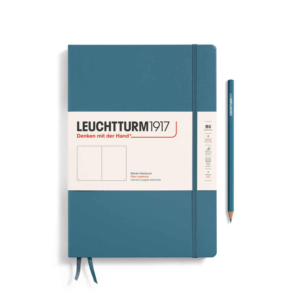 Blue notebook with Leuchtturm1917 branding and a pencil on a white background