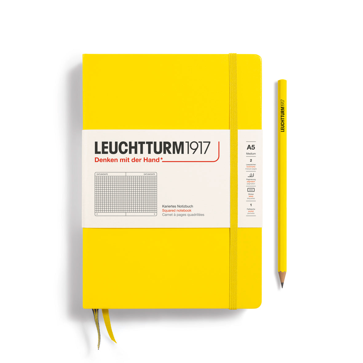Yellow notebook with a pencil on a white background, featuring Leuchtturm1917 branding.