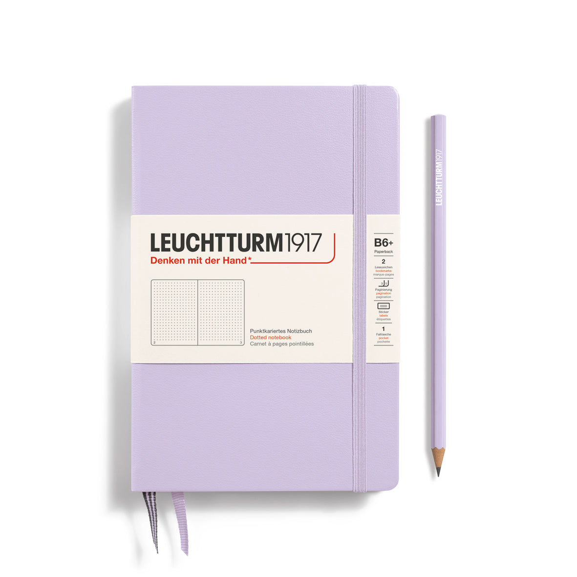 Purple notebook with a pencil on a white background, featuring Leuchtturm1917 branding.