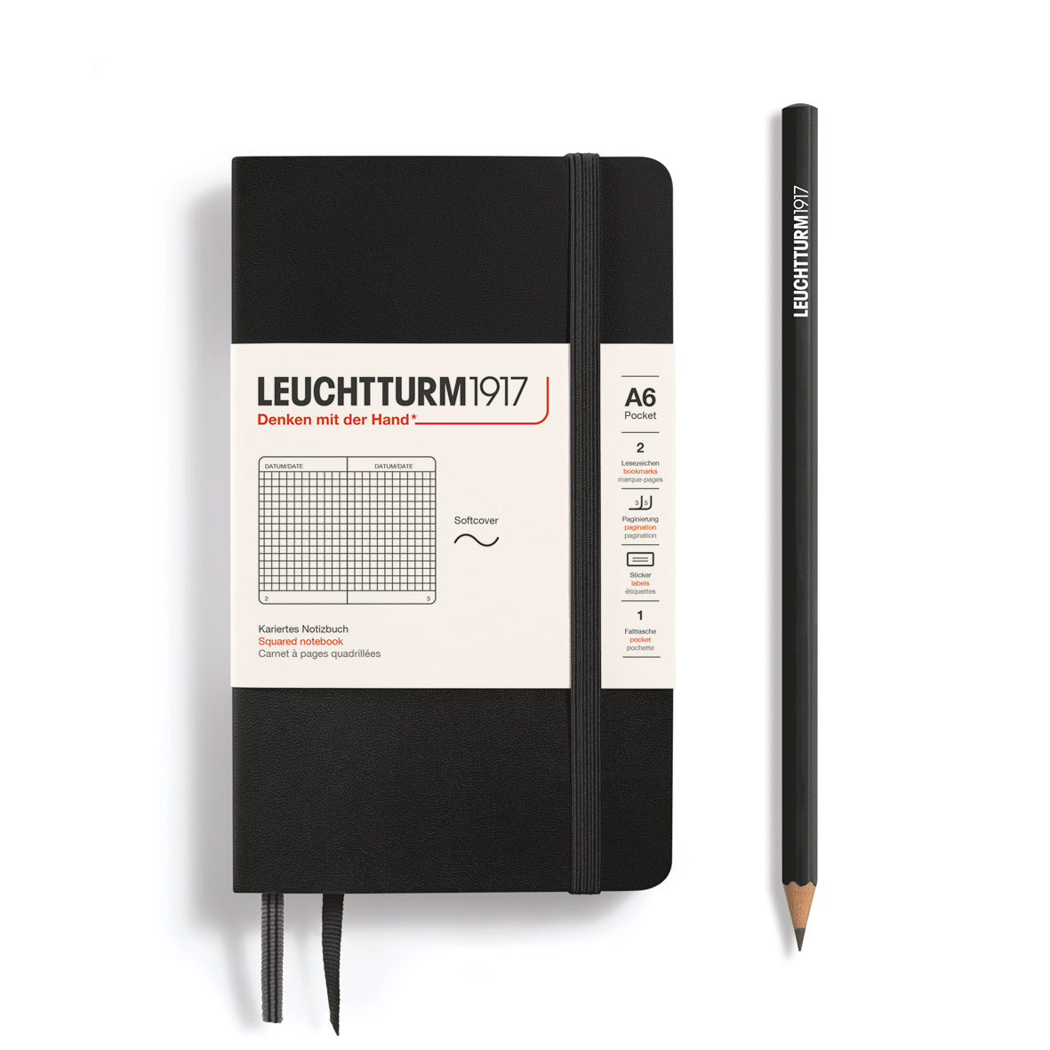 Black notebook with white label and a pencil on a white background, featuring Leuchtturm1917 branding.