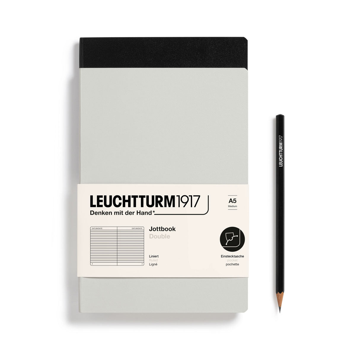 Leuchtturm1917 notebook with a pencil on a white background