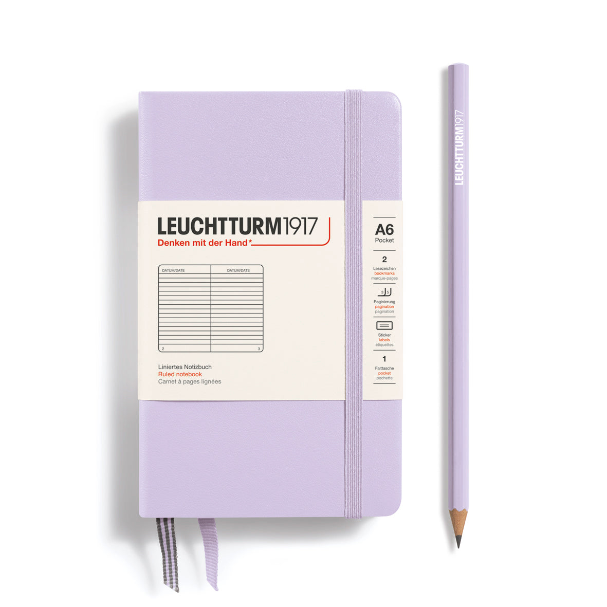 Purple notebook with a pencil on a white background, featuring Leuchtturm1917 branding.
