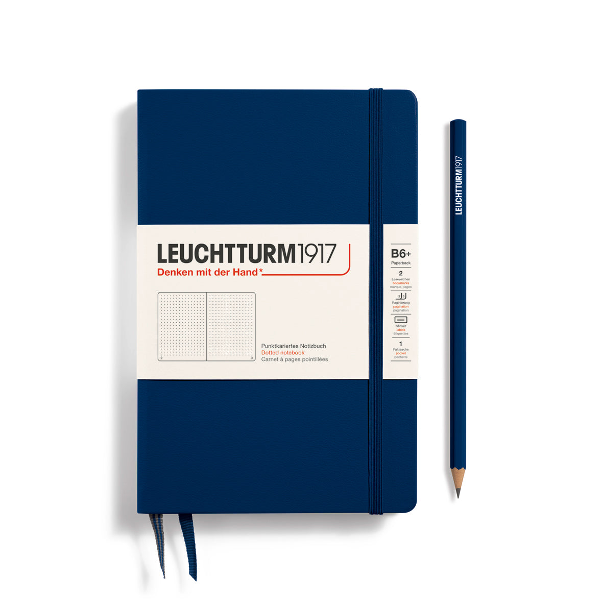 Blue notebook with Leuchtturm1917 branding and a pencil on a white background