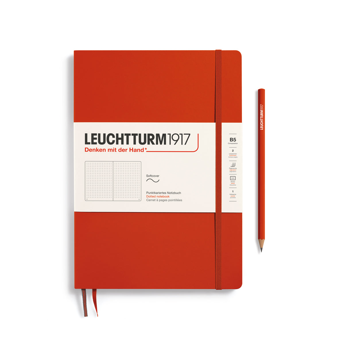 Red notebook with a pen on a white background, featuring Leuchtturm1917 branding.