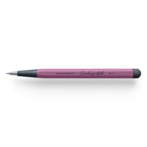 Purple pencil on a white background