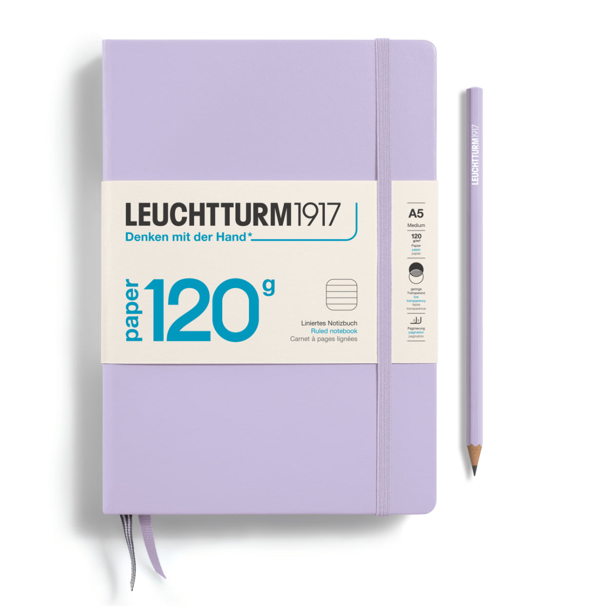 Purple notebook with Leuchtturm1917 branding and a pencil on a white background