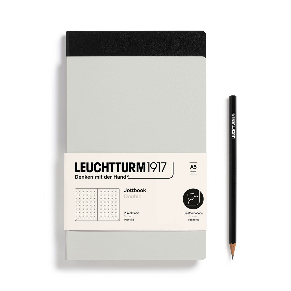 Leuchtturm1917 notebook with a pencil on a white background