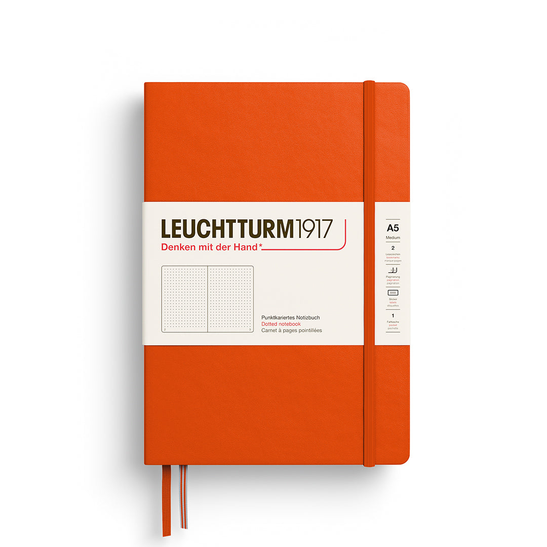Orange notebook with white label featuring 'Leuchtturm1917' on a white background