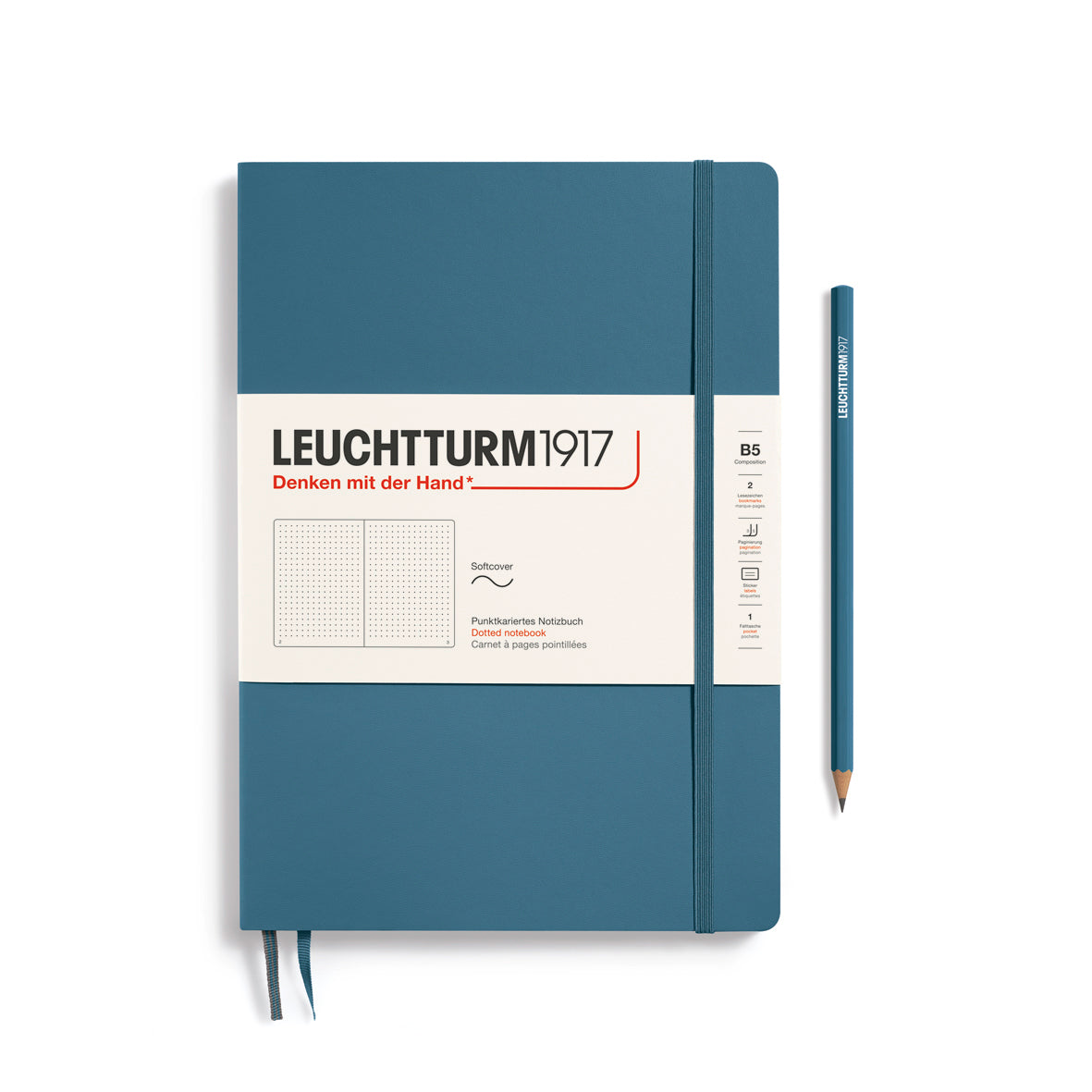 Blue notebook with Leuchtturm1917 branding and a pencil on a white background