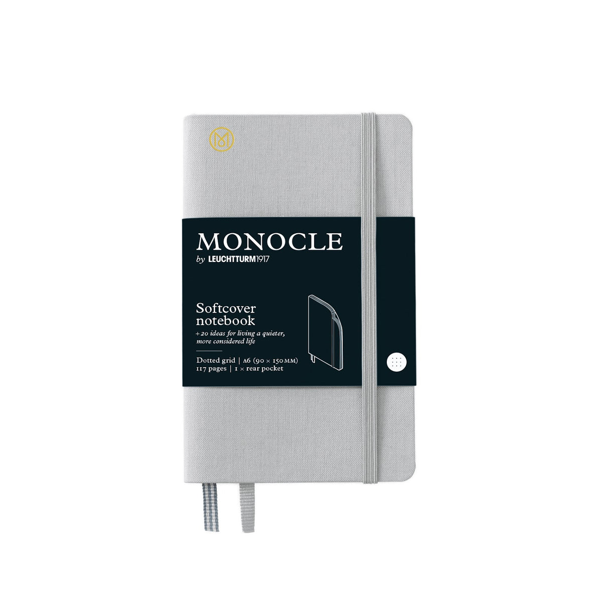 Gray notebook with a black label featuring 'Monocle' branding on a white background