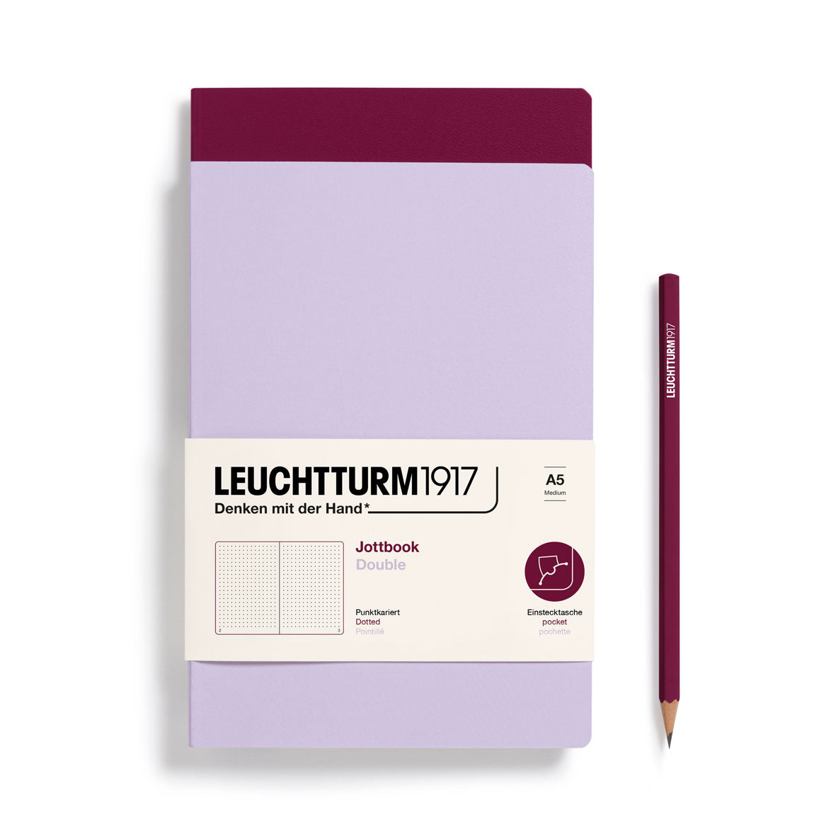 Leuchtturm1917 notebook with a matching pencil on a white background