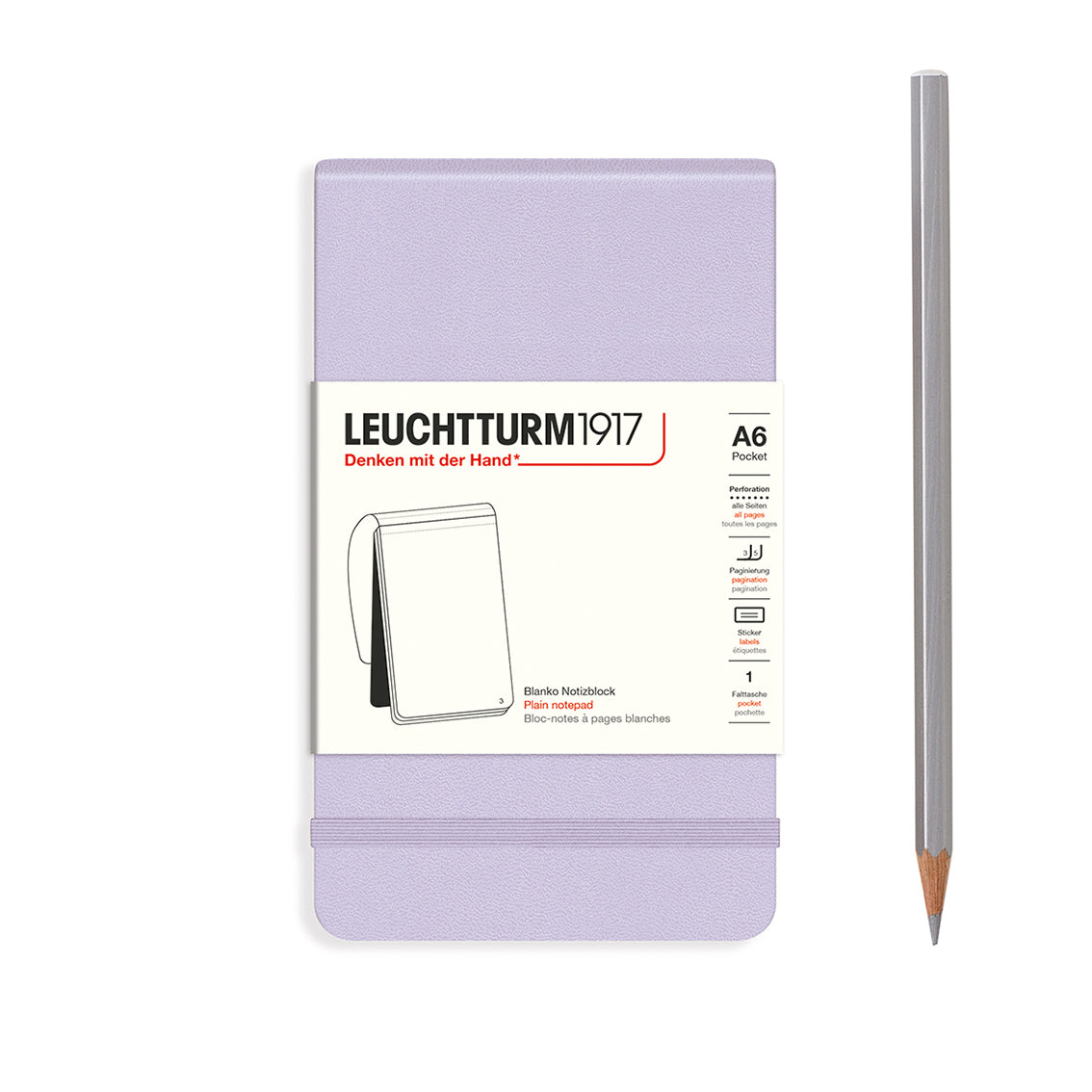 Purple notebook with Leuchtturm1917 branding and a pencil on a white background