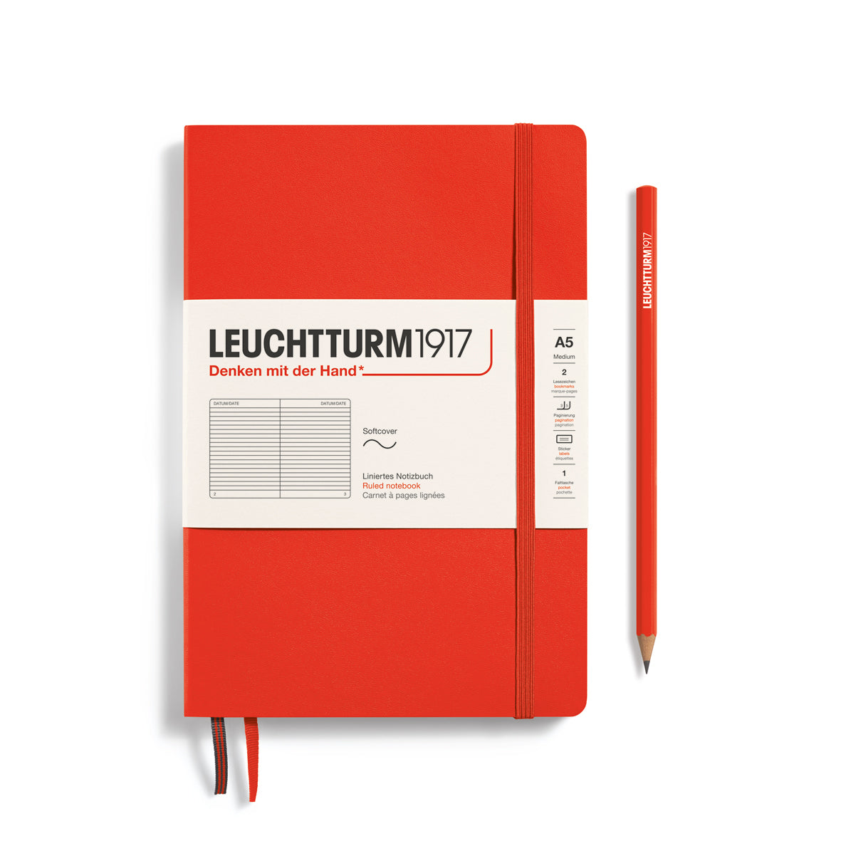 Red notebook with white cover featuring Leuchtturm1917 branding on a white background