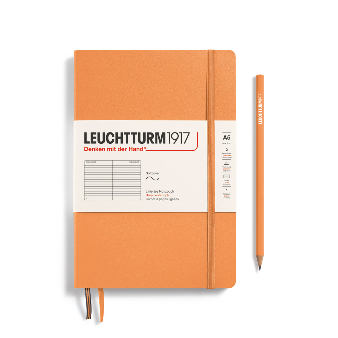 Orange notebook with white label and pencil on a white background, featuring Leuchtturm1917 branding.