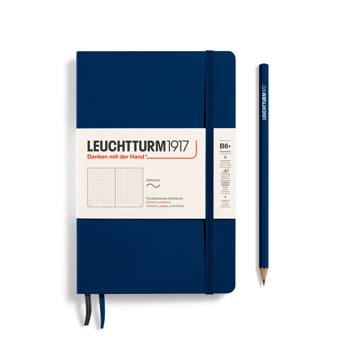 Green notebook with Leuchtturm1917 branding and a pencil on a white background