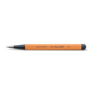 Pencil with a black tip and wooden body on a white background