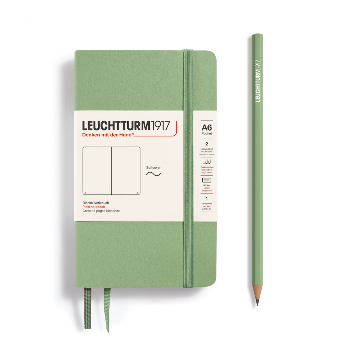 Green notebook and pencil with Leuchtturm1917 branding on a white background
