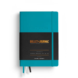 Teal Bullet Journal notebook on a white background
