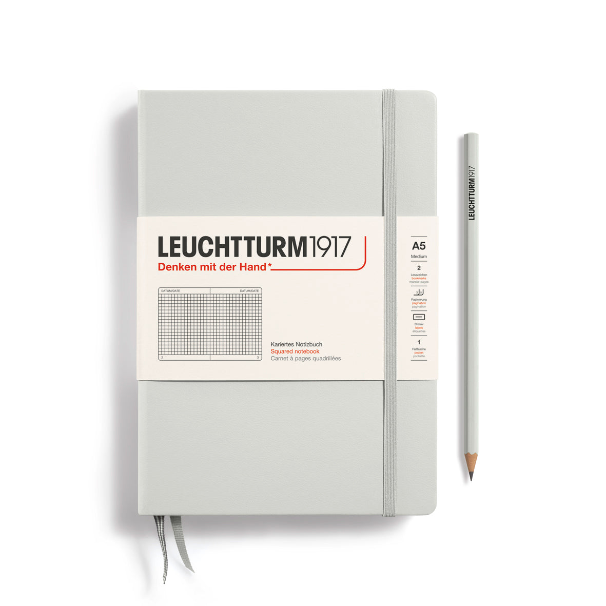 Leuchtturm1917 notebook with a pencil on a white background