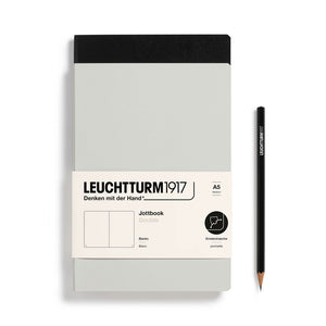 Leuchtturm1917 notebook with a pencil on a white background