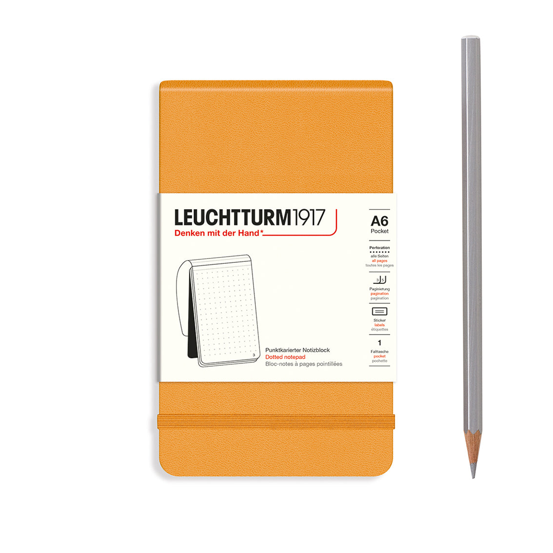 Orange notebook with Leuchtturm1917 branding and a pencil on a white background