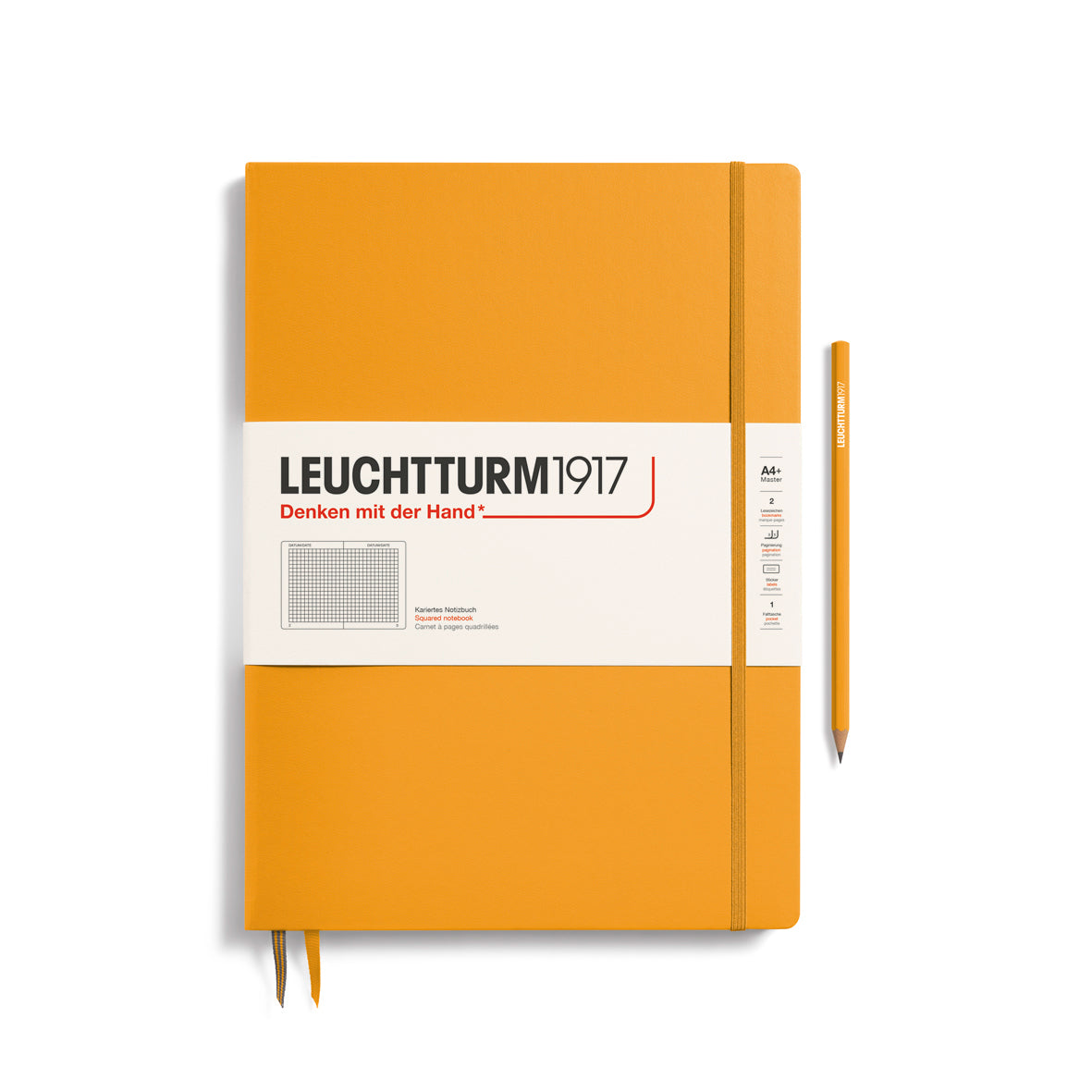 Orange notebook with a pen on a white background, featuring the Leuchtturm1917 brand.