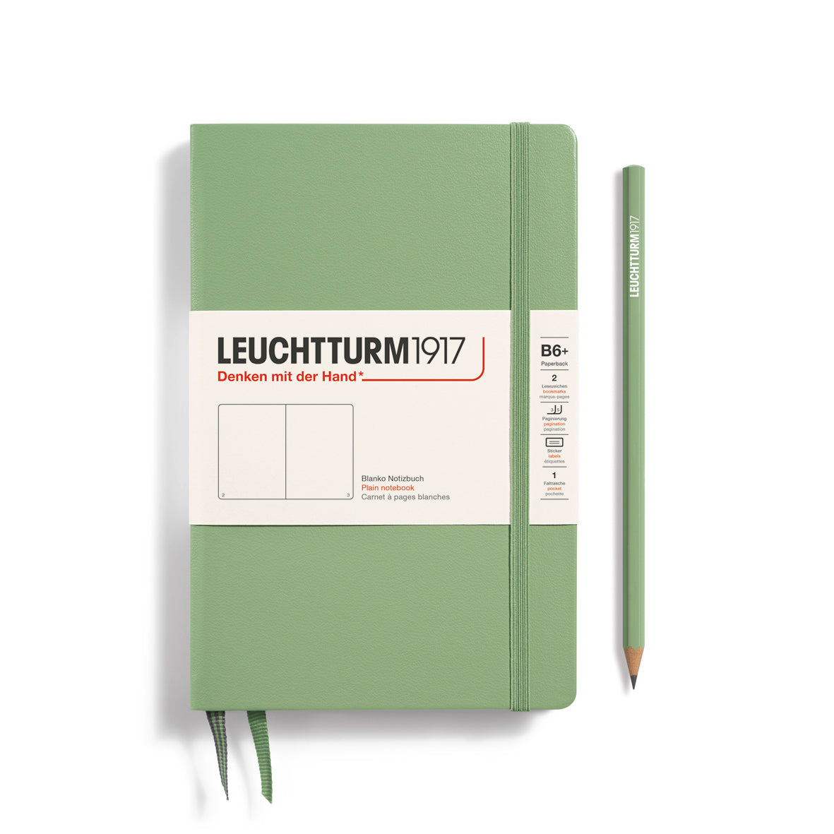 Green notebook with a pencil on a white background, featuring Leuchtturm1917 branding.