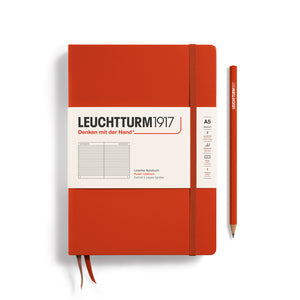 Red notebook with Leuchtturm1917 branding on a white background