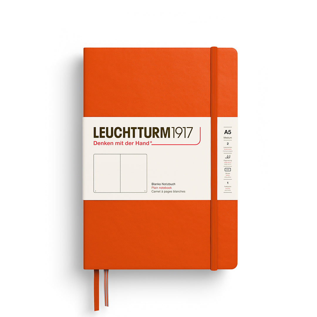 Orange notebook with white label featuring 'Leuchtturm1917' on a white background