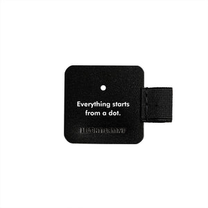 Black square card and pen loop with text 'Everything starts from a dot.' on a white background