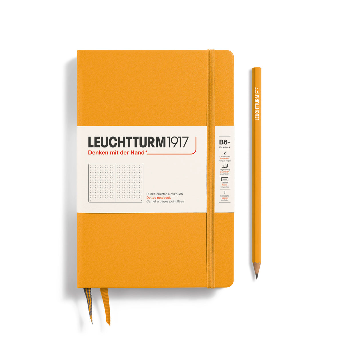 Orange notebook with a pencil on a white background, featuring Leuchtturm1917 branding.