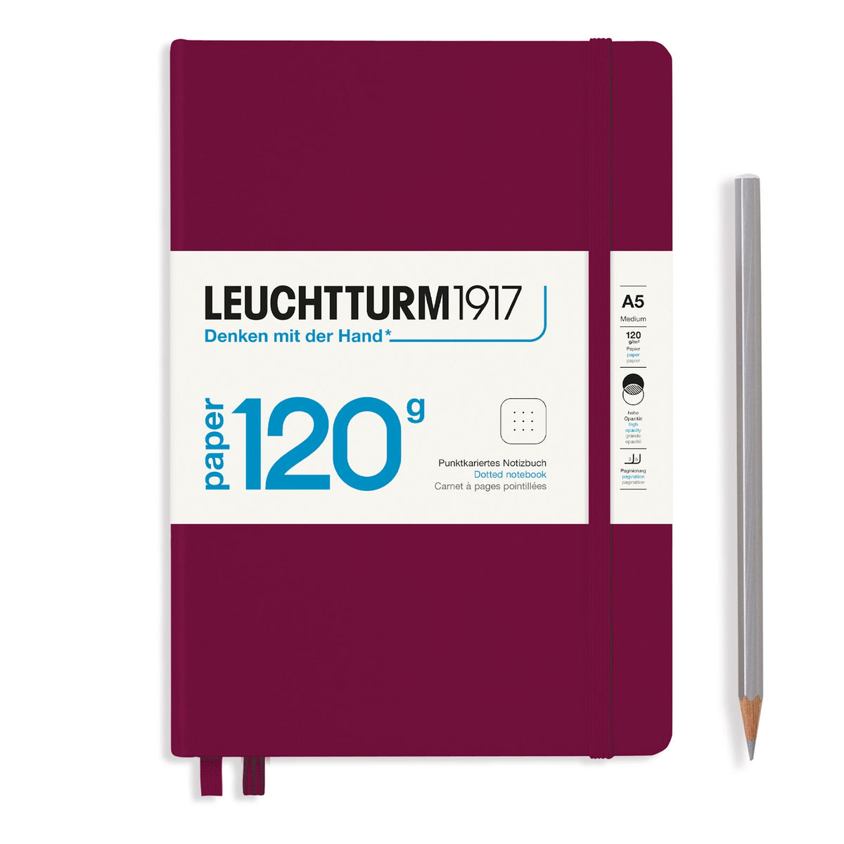 Purple notebook with Leuchtturm1917 branding and a pencil on a white background