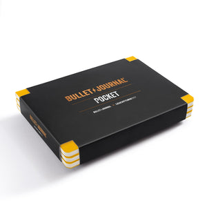 Black and yellow Bullet Journal Pocket packaging on a white background