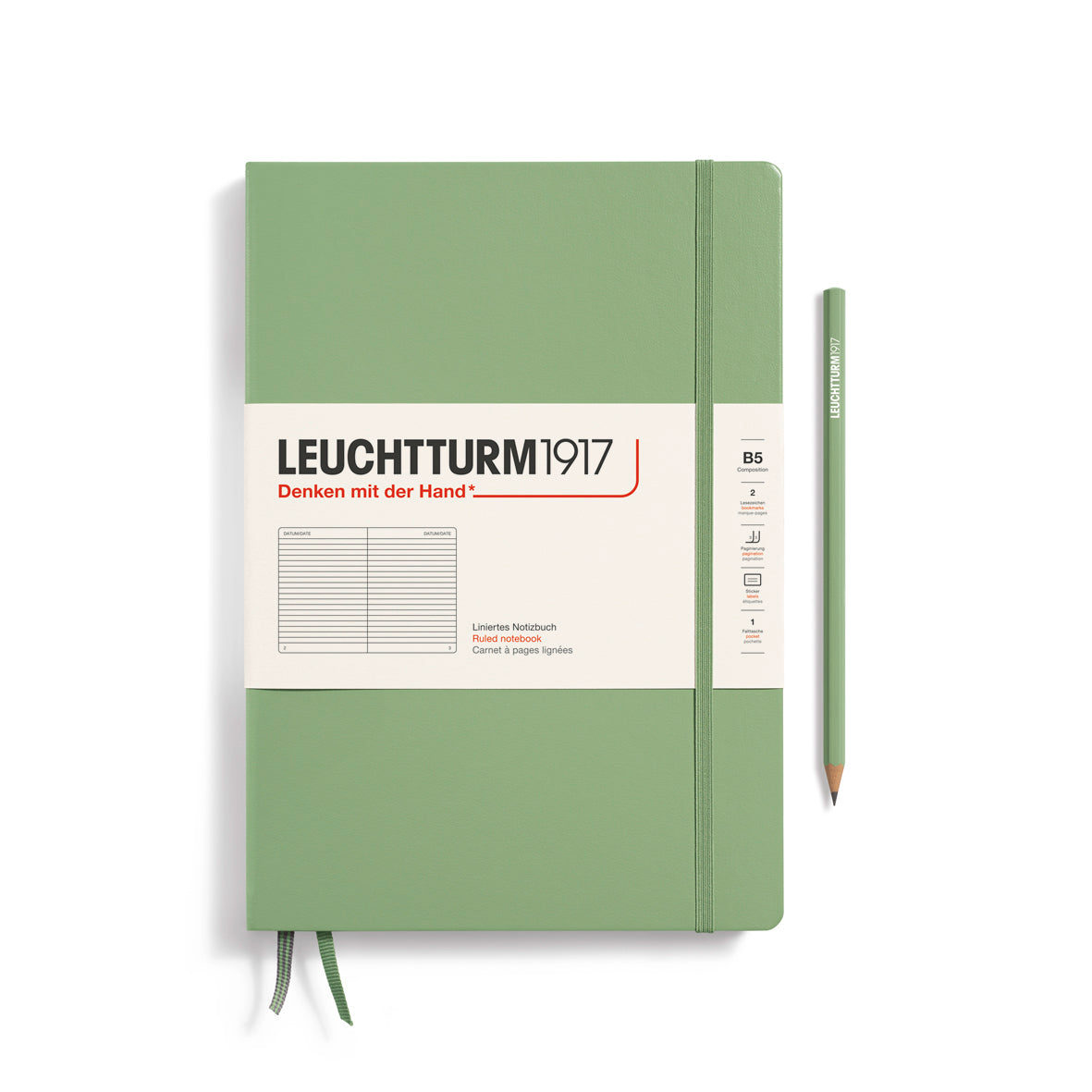 Green notebook with white label and pencil on a white background