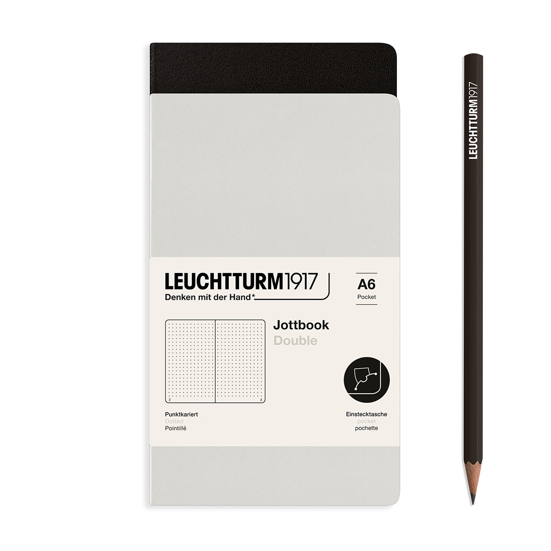 Leuchtturm1917 notebook and pencil on a white background