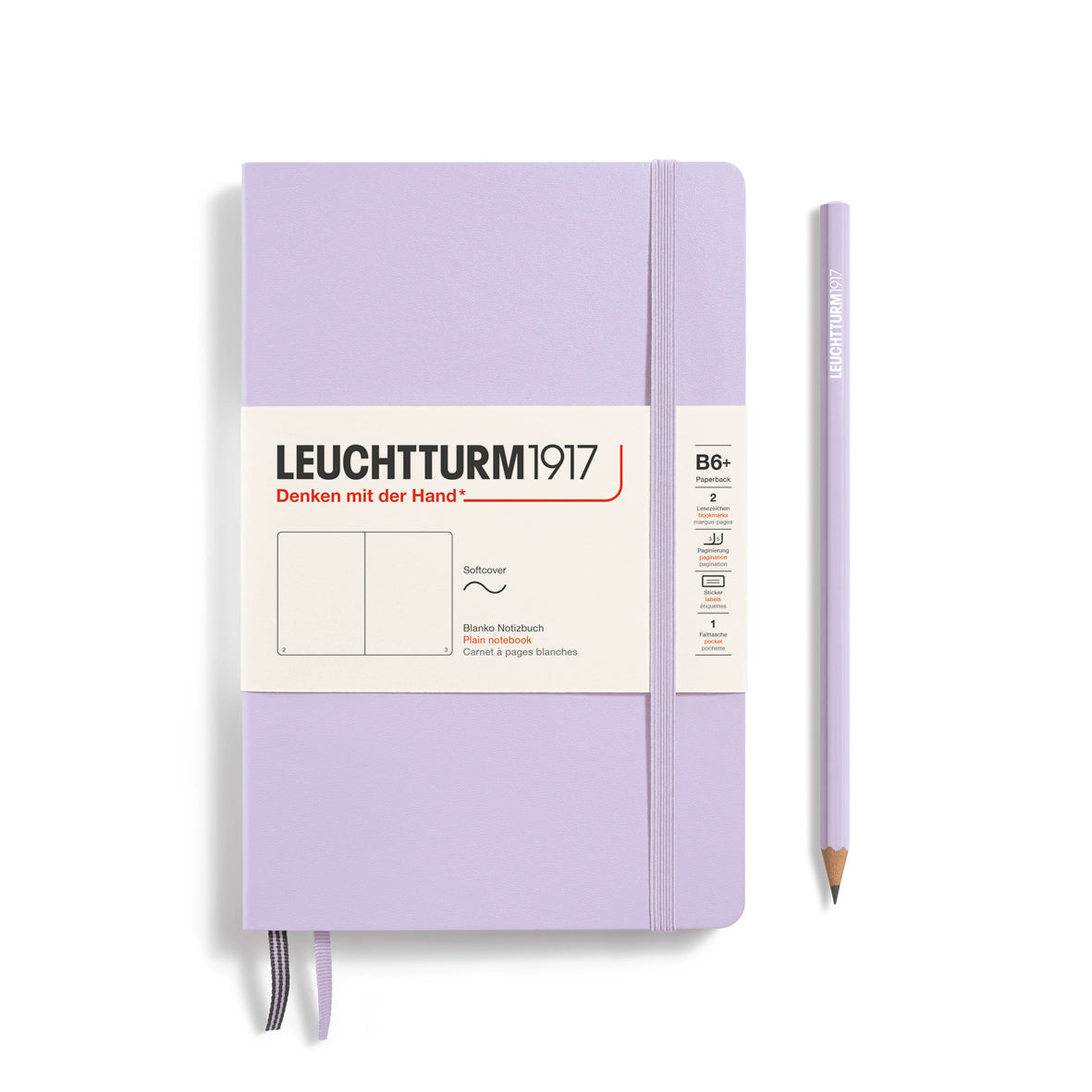 Purple notebook with Leuchtturm1917 branding and a pencil on a white background