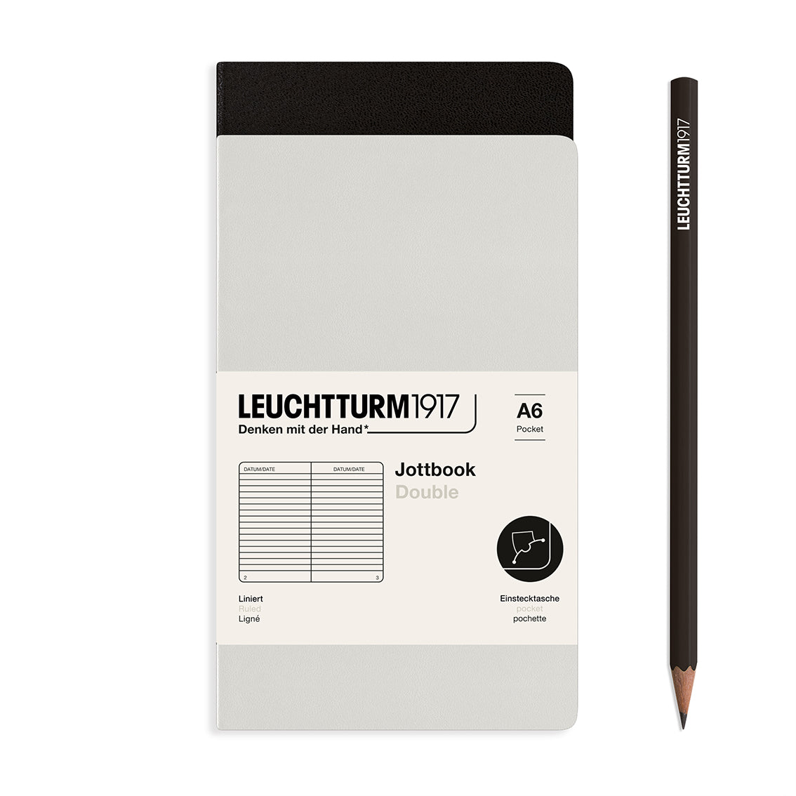 Leuchtturm1917 notebook and pencil on a white background